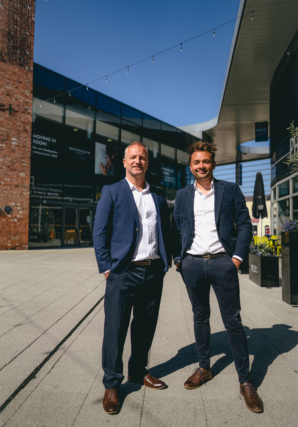 Simon Thomas and Nick Ponting in front of new office